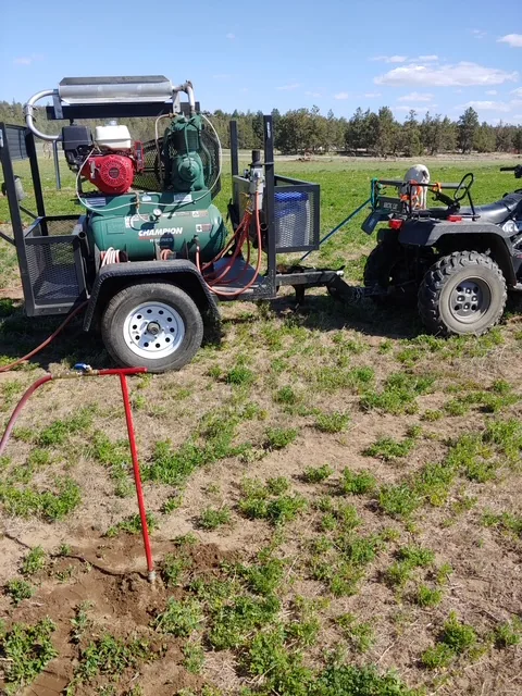 Actual Mule trailer-mounted equipment connected to an ATV in the field